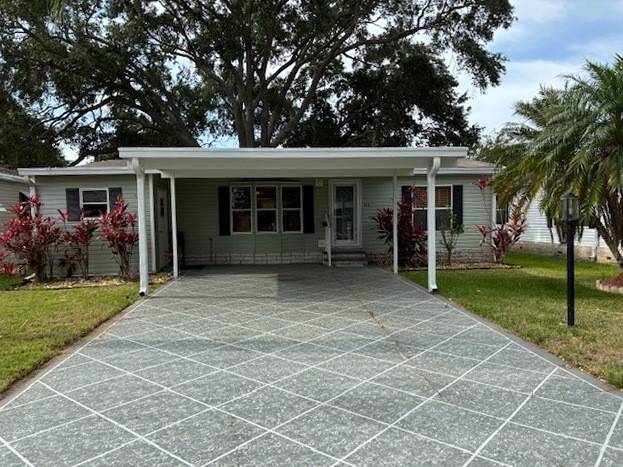 Lake Alfred, FL Mobile Home for Sale located at 303 Winter Garden Court Kings Pointe
